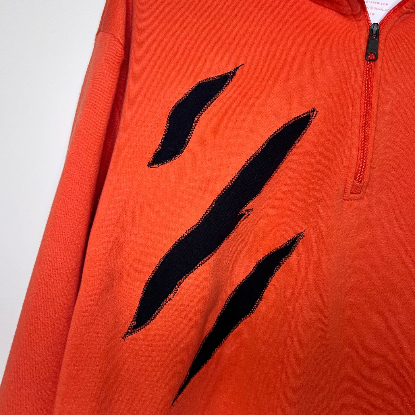 Who Dey Embroidered Striped Upcycled Orange Quarter-Zip Sweatshirt